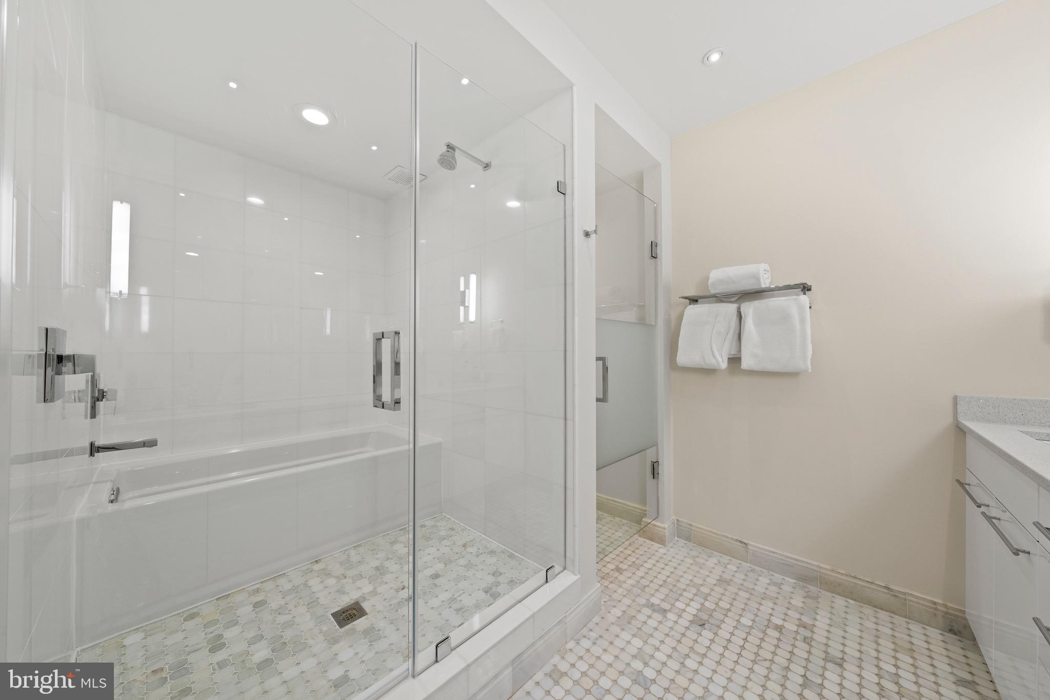 3251 Prospect Street Northwest, Unit 402 Washington, DC 20007 - Photo 34 of 50 Primary En-Suite Bathroom