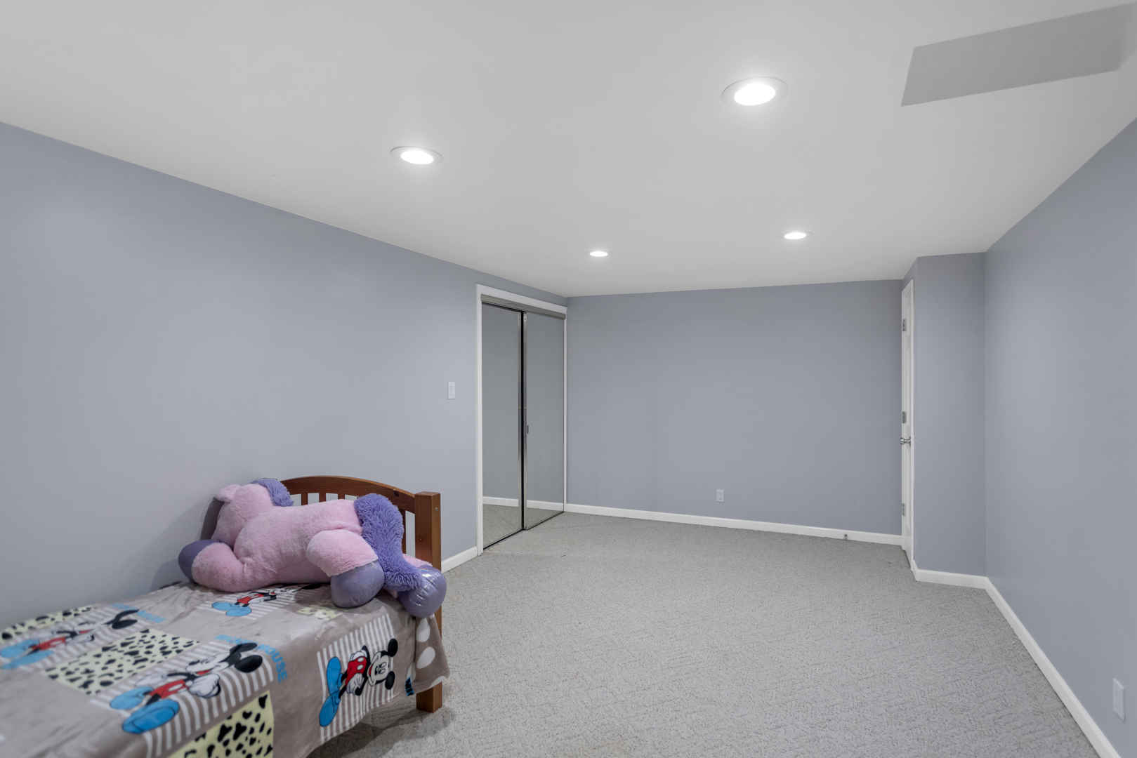 1548 Old Forge Road Bartlett, IL 60103 - Photo 38 of 50 a bedroom with a bed and wooden floor