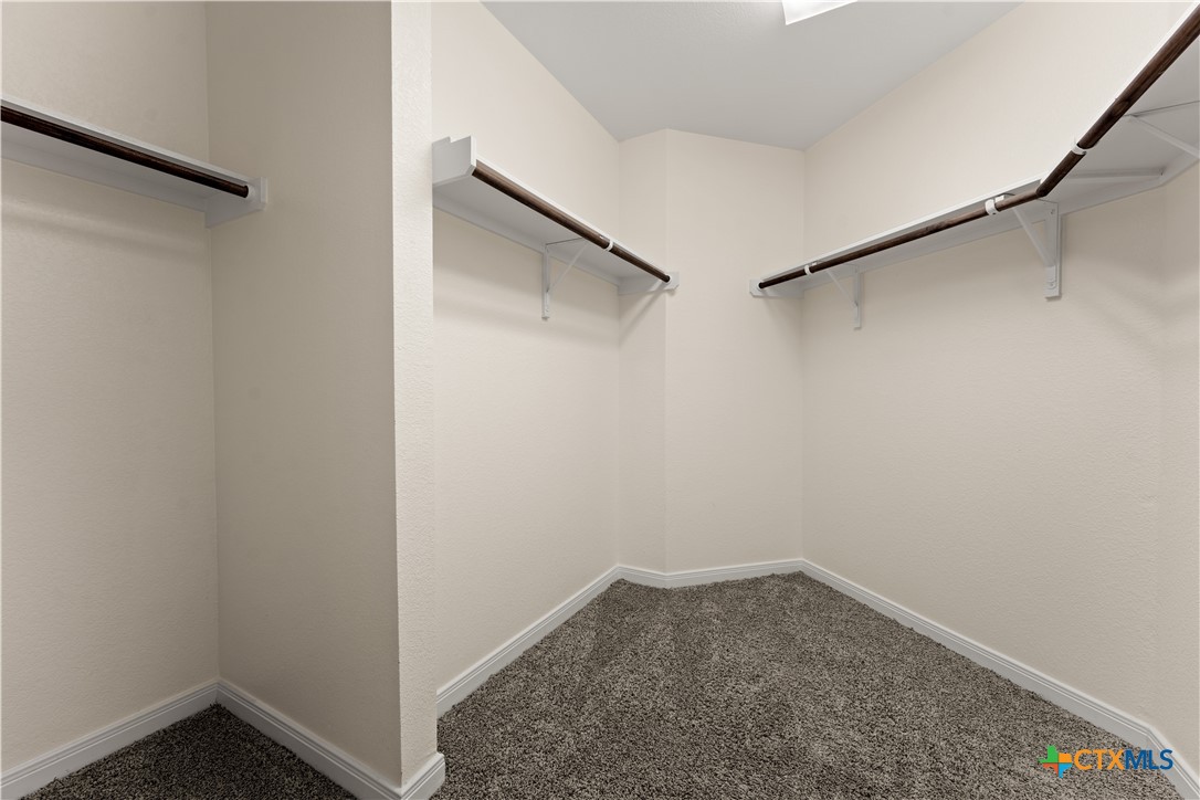 4124 Riata Ranch Road Waco, TX 76705 - Photo 12 of 20 Primary Large Walk-in Closet