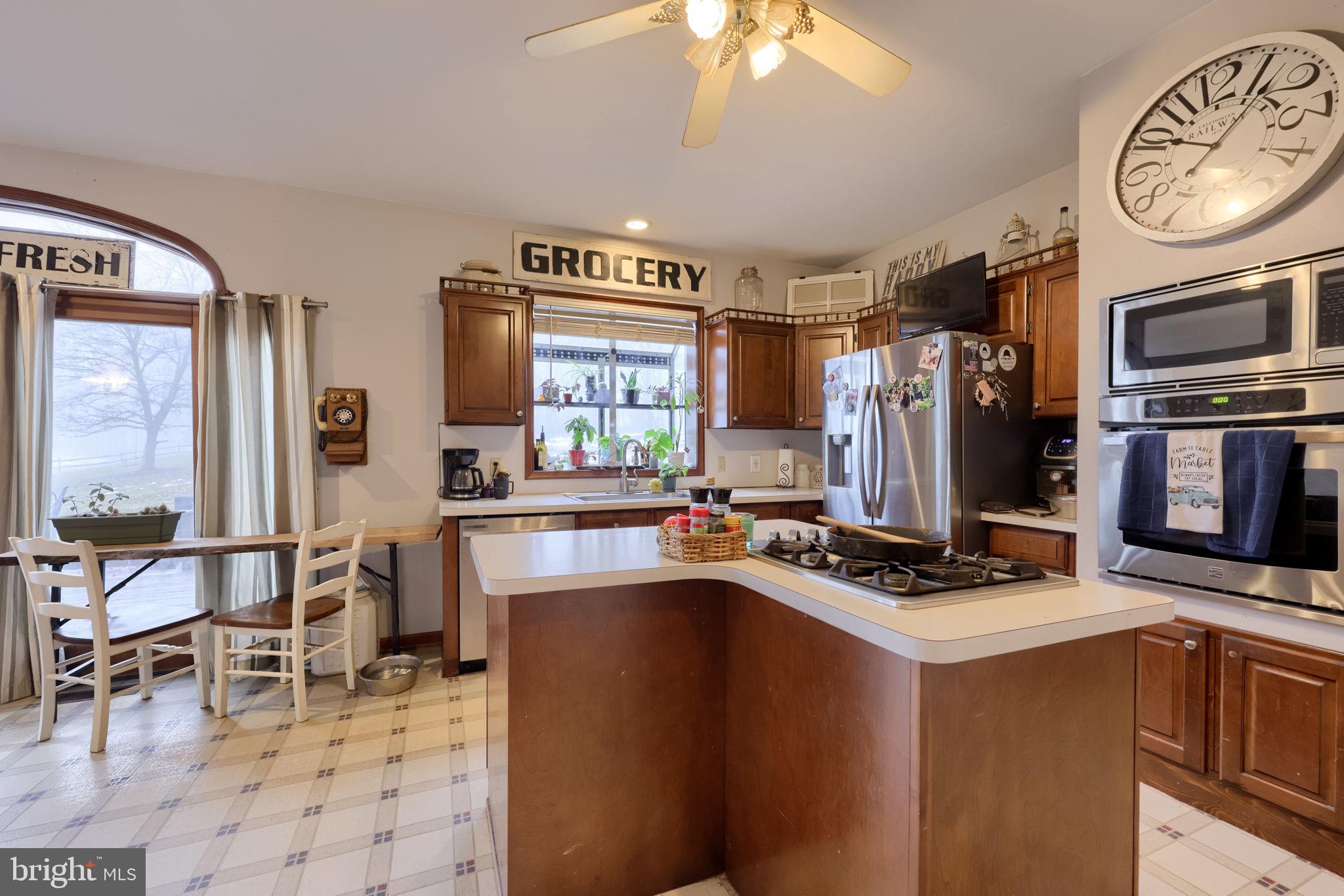 180 Springvale Road Red Lion, PA 17356 - Photo 14 of 70 a work place with furniture a flat screen tv and a window