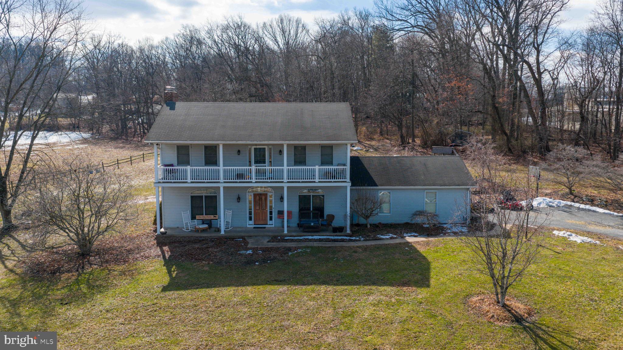 180 Springvale Road Red Lion, PA 17356 - Photo 2 of 70 a aerial view of a house with swimming pool and a yard