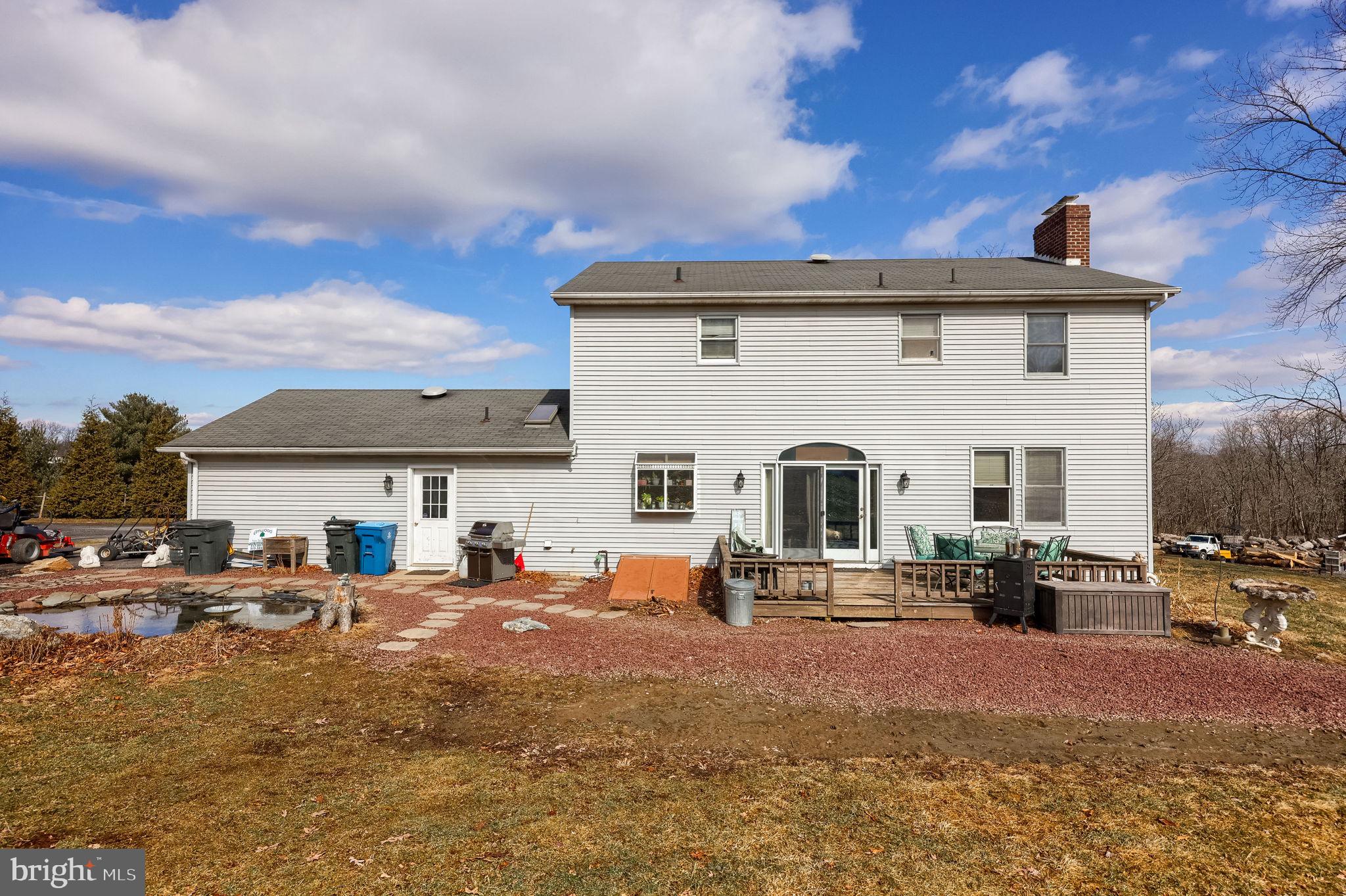 180 Springvale Road Red Lion, PA 17356 - Photo 41 of 70 a view of a patio with couches chairs and a fire pit
