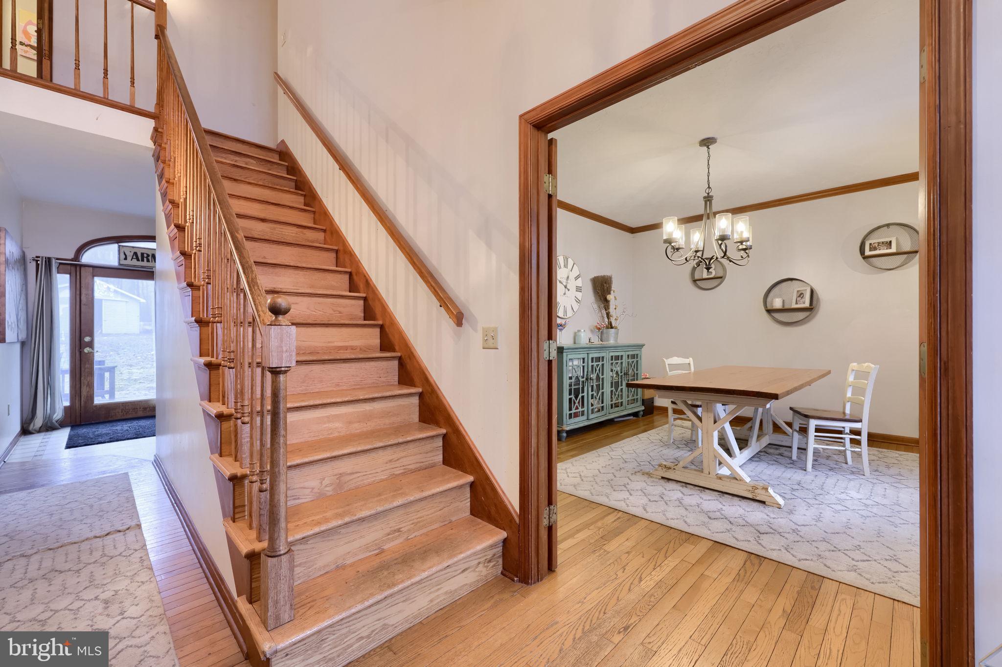 180 Springvale Road Red Lion, PA 17356 - Photo 5 of 70 a view of dining room and hall with wooden floor