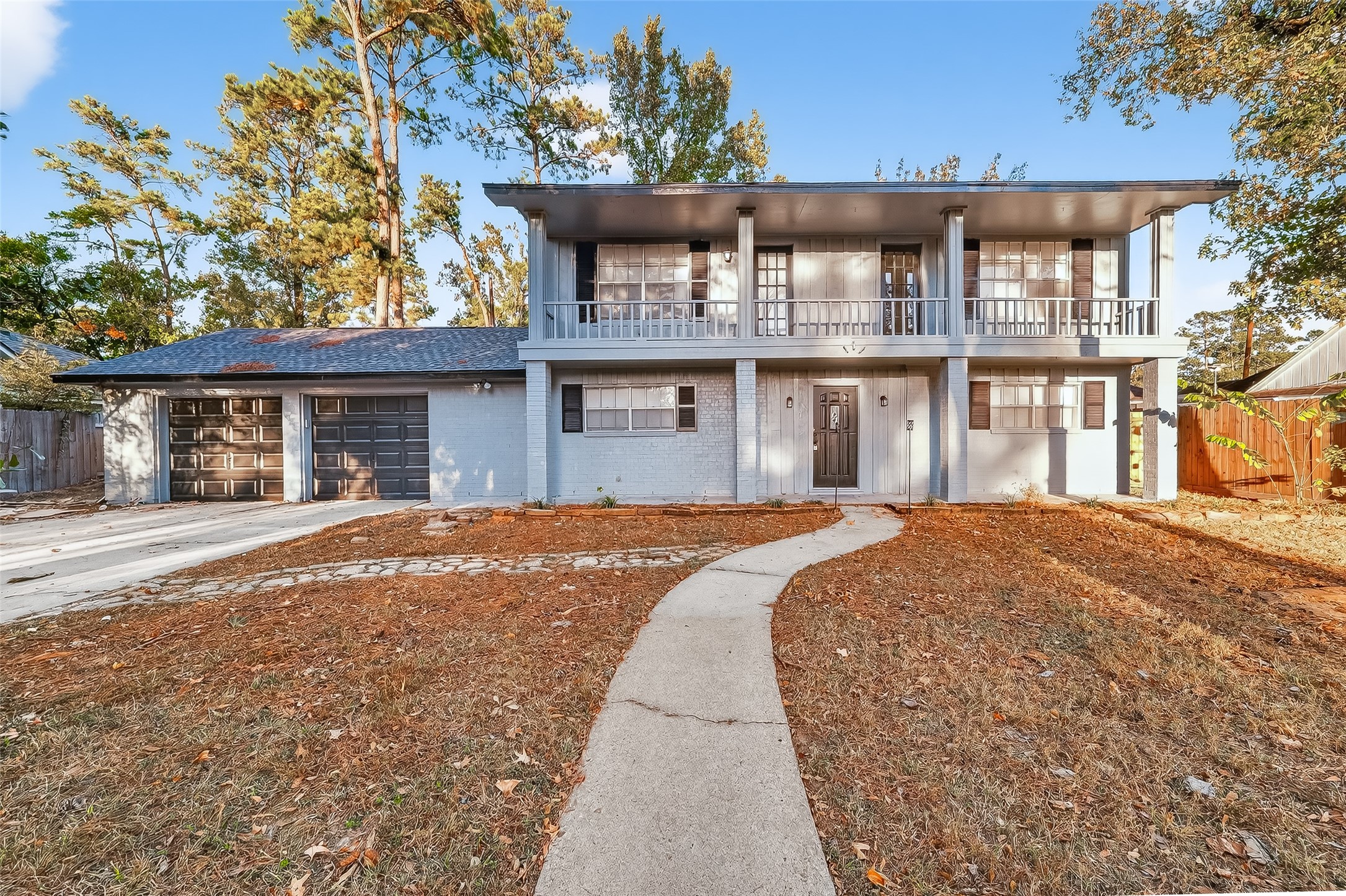 26522 Hillside Drive Spring, TX 77386 - Photo 1 of 45 front view of a house with a swimming pool