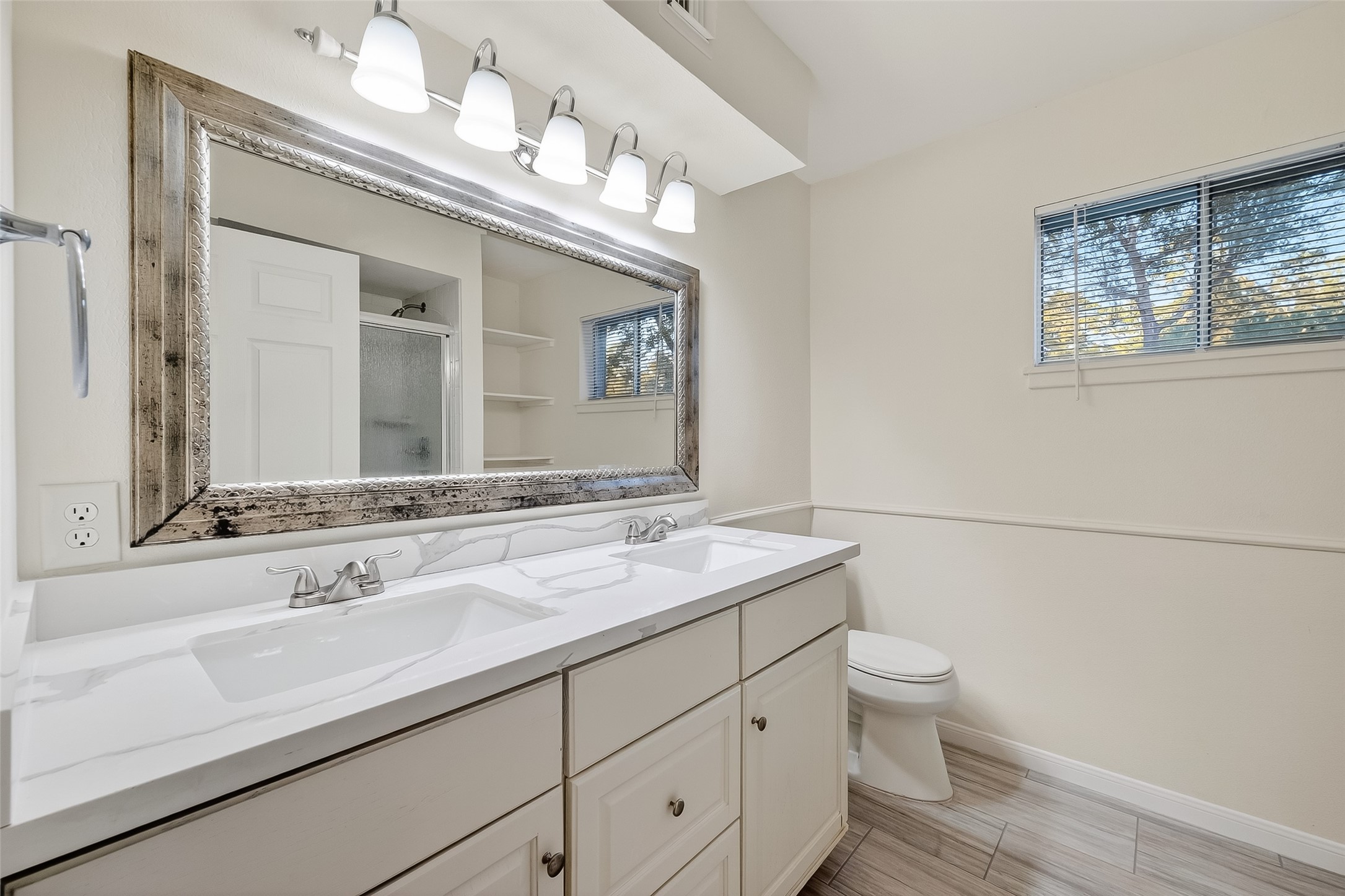 26522 Hillside Drive Spring, TX 77386 - Photo 26 of 45 a bathroom with a sink and a mirror