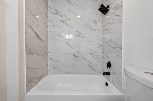 a bathroom with a bathtub