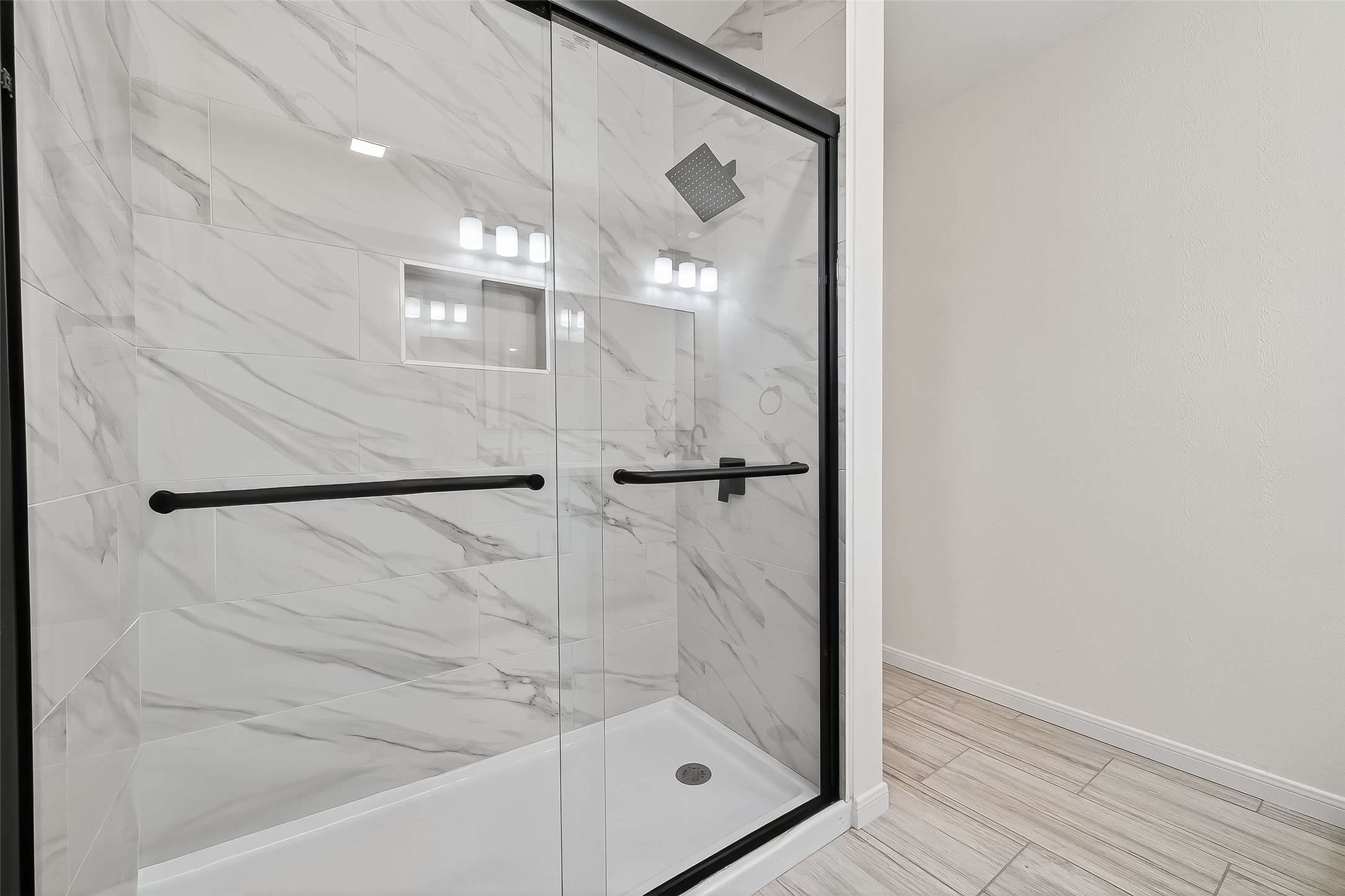 26522 Hillside Drive Spring, TX 77386 - Photo 36 of 45 a bathroom with a glass shower door