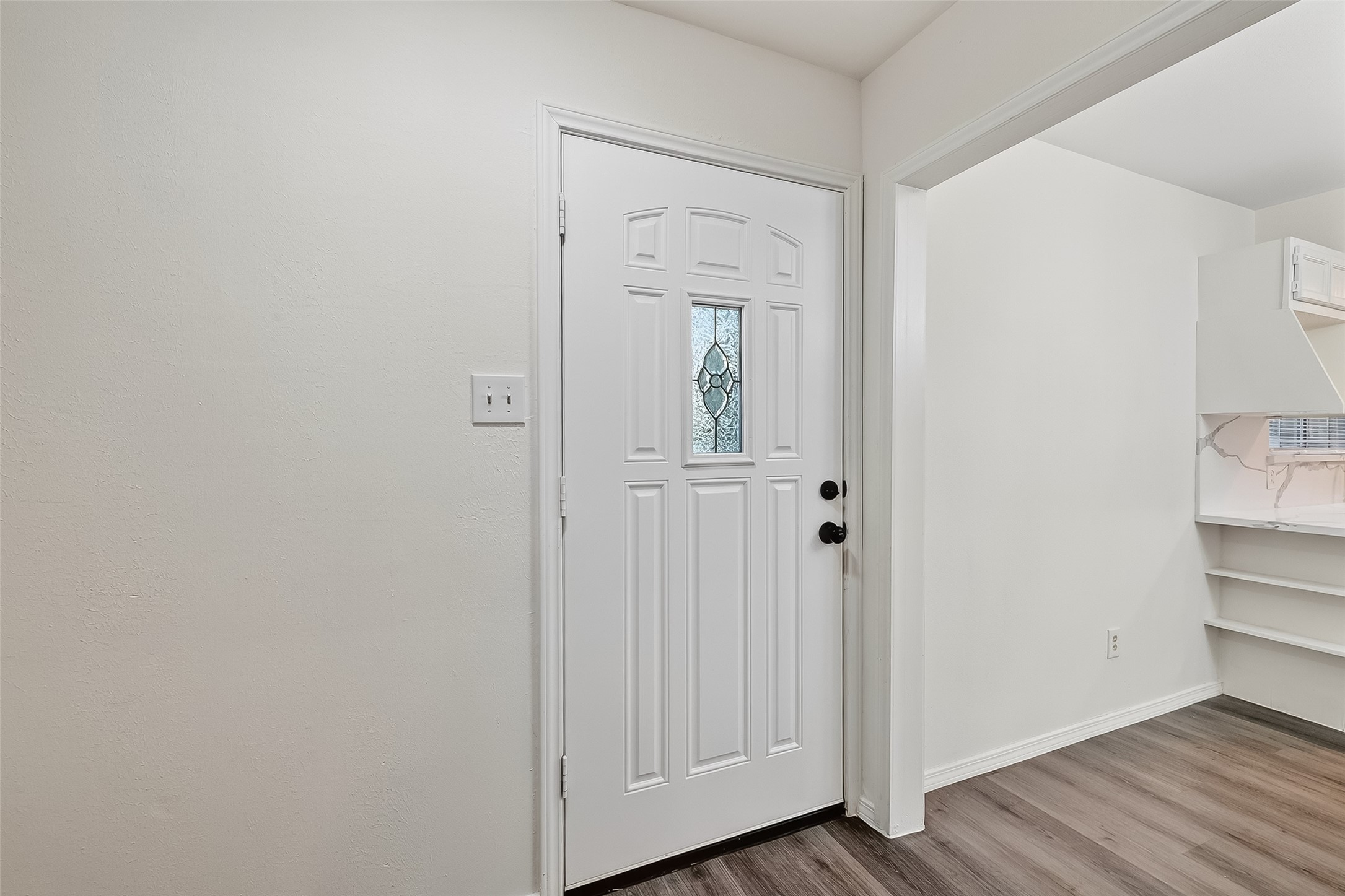 26522 Hillside Drive Spring, TX 77386 - Photo 5 of 45 a view of a closet area with wooden floor