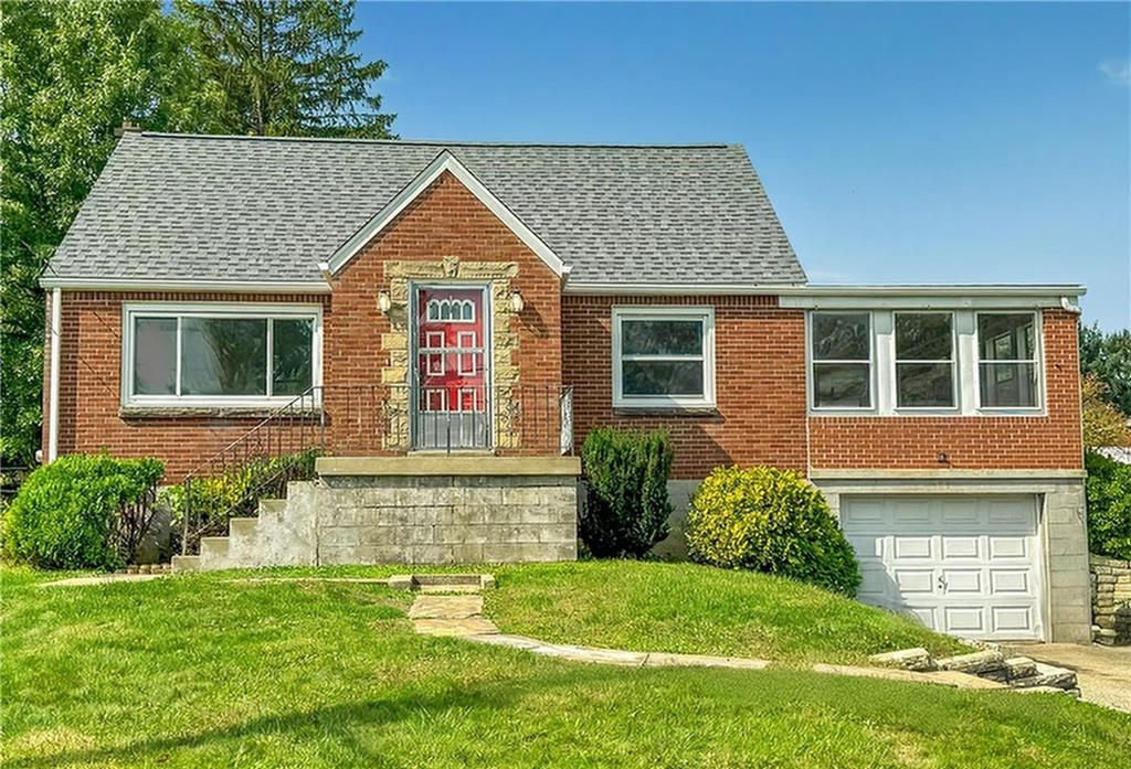 488 Meadow Road Irwin, PA 15642 - Photo 1 of 23 a front view of a house with a yard