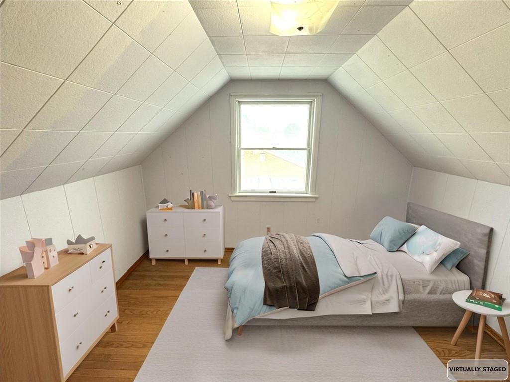 488 Meadow Road Irwin, PA 15642 - Photo 11 of 23 a bedroom with a bed and window