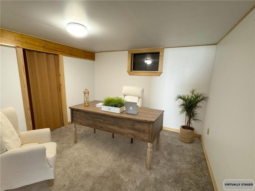 488 Meadow Road Irwin, PA 15642 - Photo 17 of 23 a view of a livingroom with furniture and a potted plant