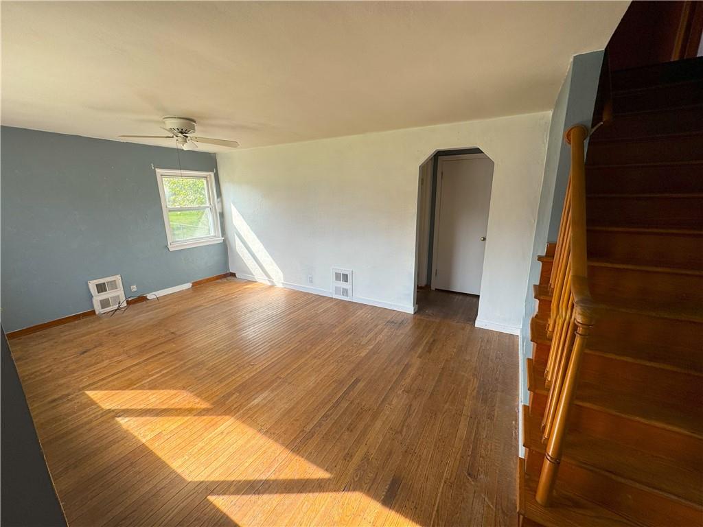 488 Meadow Road Irwin, PA 15642 - Photo 4 of 23 a bedroom with wooden floor and window