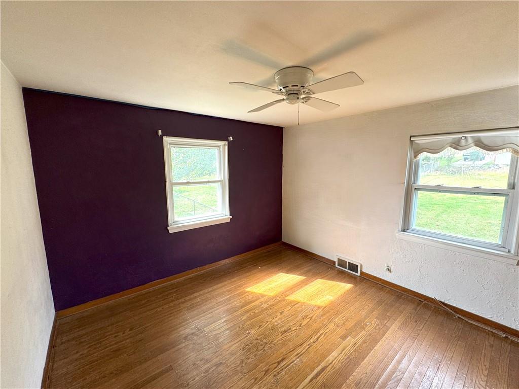 488 Meadow Road Irwin, PA 15642 - Photo 9 of 23 a view of an empty room with a window