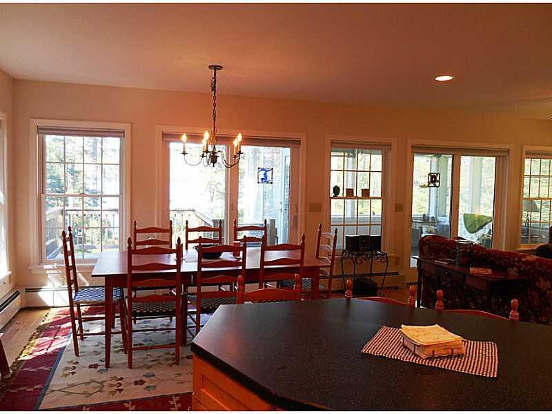 336 Edelheid Road Rangeley, ME 04970 - Photo 12 of 35 Dining Room. Open living area with...