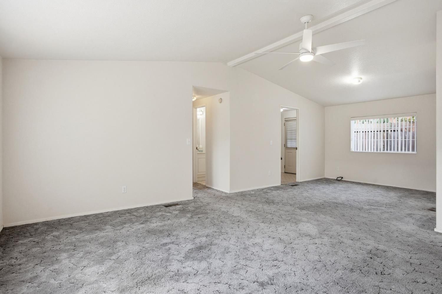 700 2nd Street, Unit 40 Galt, CA 95632 - Photo 11 of 35 an empty room with windows