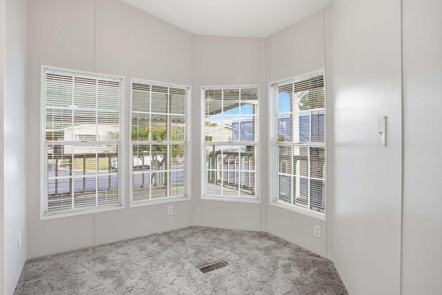 700 2nd Street, Unit 40 Galt, CA 95632 - Photo 17 of 35 a view of an empty room with a window