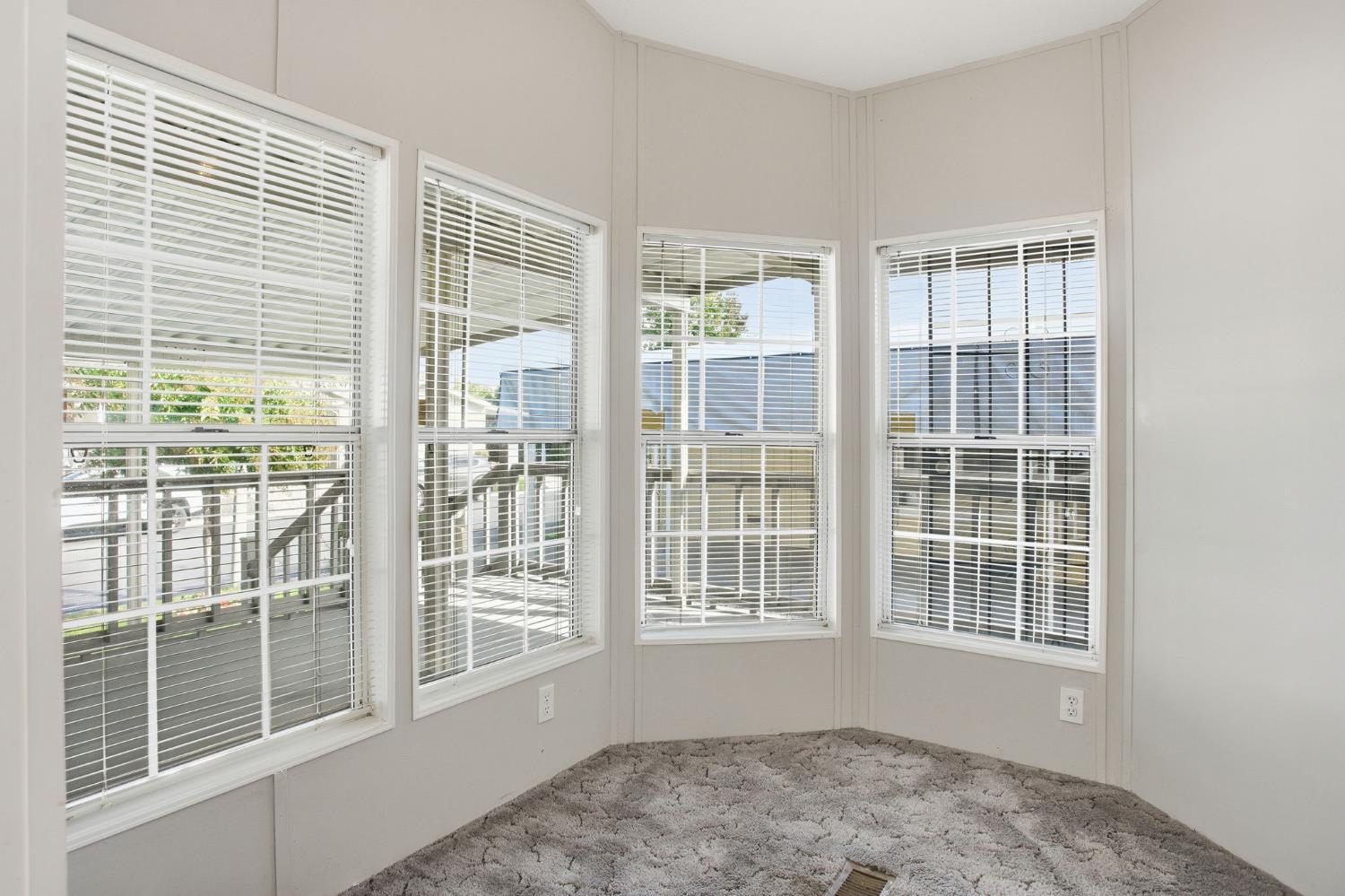 700 2nd Street, Unit 40 Galt, CA 95632 - Photo 18 of 35 a view of empty room with windows