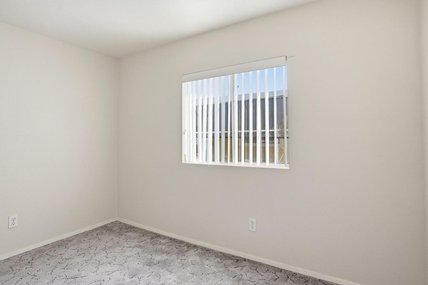 700 2nd Street, Unit 40 Galt, CA 95632 - Photo 23 of 35 an empty room with windows
