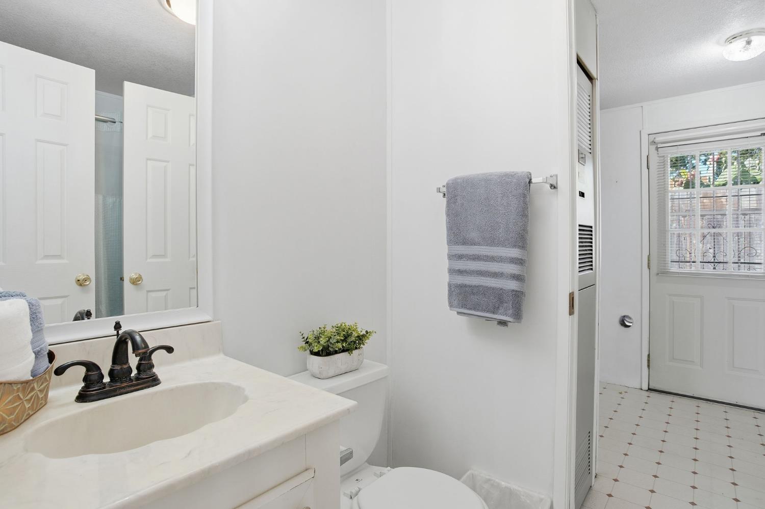 700 2nd Street, Unit 40 Galt, CA 95632 - Photo 29 of 35 a bathroom with a sink toilet and shower