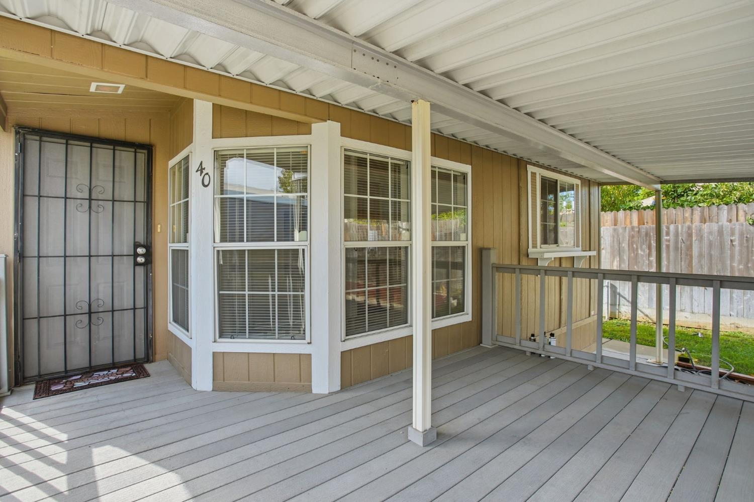 700 2nd Street, Unit 40 Galt, CA 95632 - Photo 5 of 35 a view of entrance with a balcony