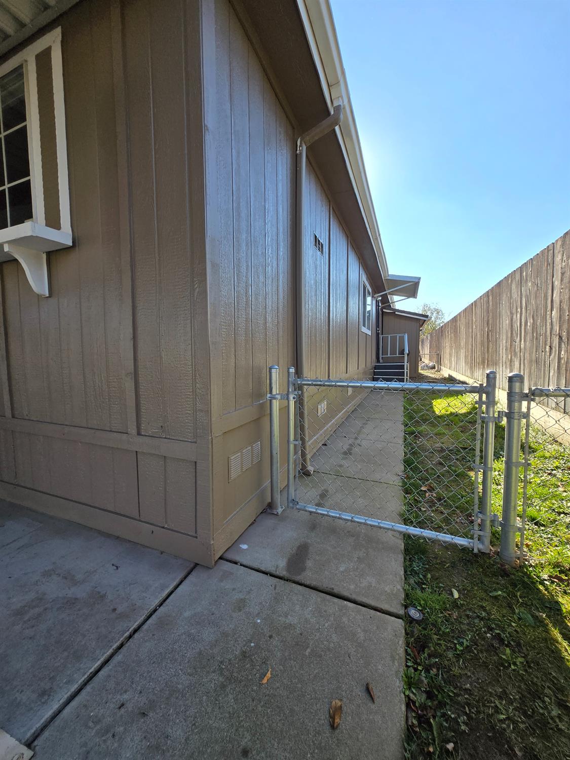 700 2nd Street, Unit 40 Galt, CA 95632 - Photo 6 of 35 a view of a house with a backyard