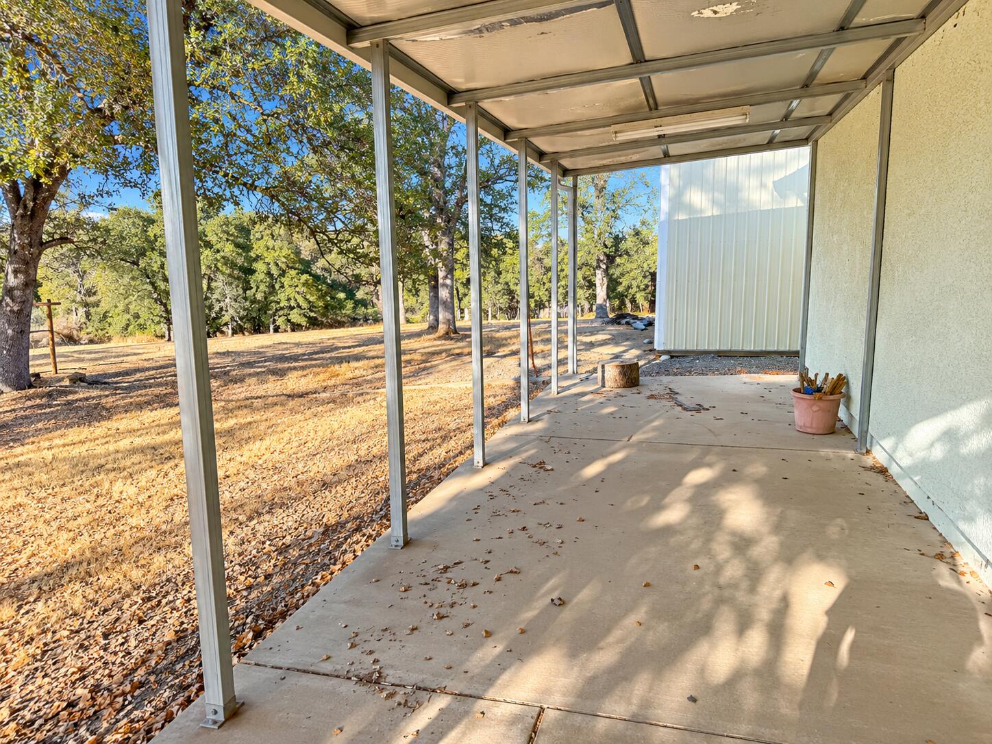 13725 Gas Point Road Igo, CA 96047 - Photo 8 of 23 Sunny Covered Patio Overlooking Woodland