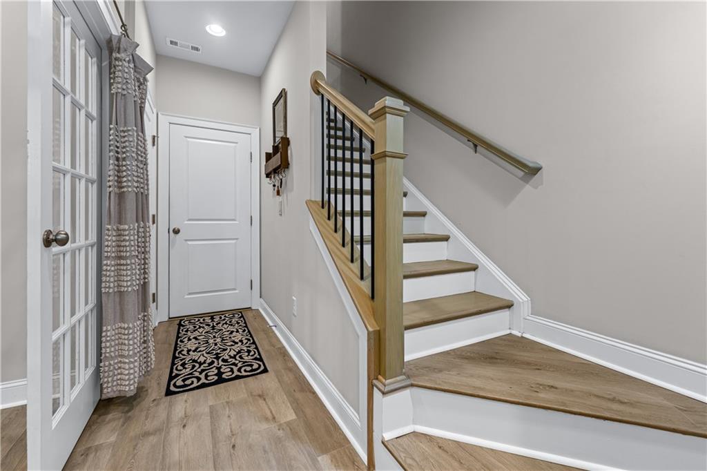 3766 Alstead Manor Way Suwanee, GA 30024 - Photo 16 of 41 a view of wooden floor and entryway