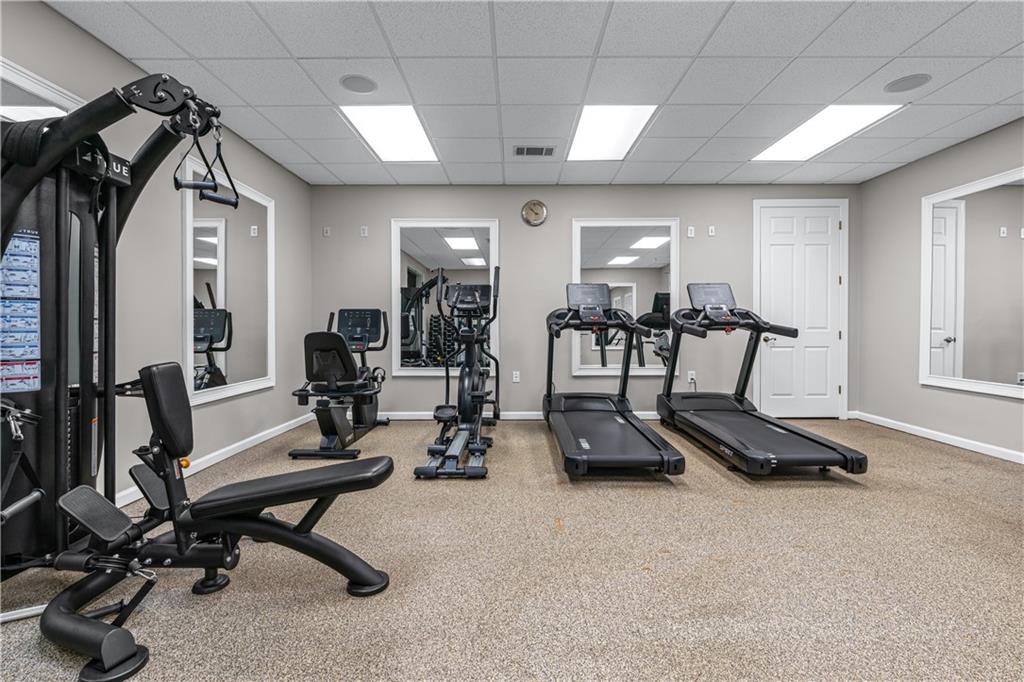 3766 Alstead Manor Way Suwanee, GA 30024 - Photo 33 of 41 a view of a room with gym equipment