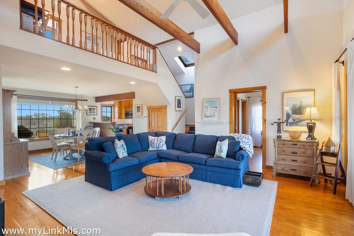13 Eat Fire Spring Road Nantucket, MA 02554 - Photo 12 of 43 a living room with furniture a rug and a view