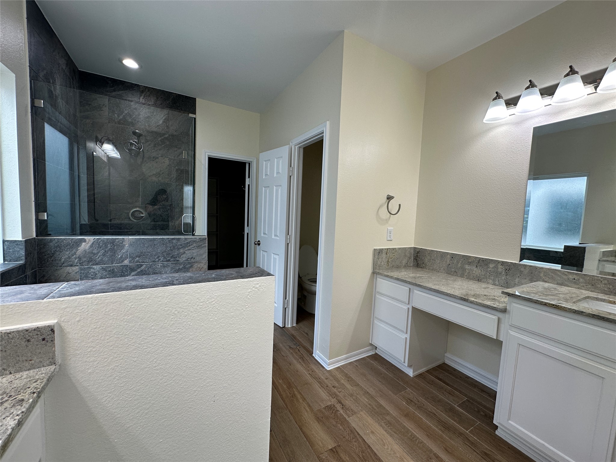 2015 Harlem Street Houston, TX 77020 - Photo 11 of 18 a bathroom with a granite countertop sink and a mirror