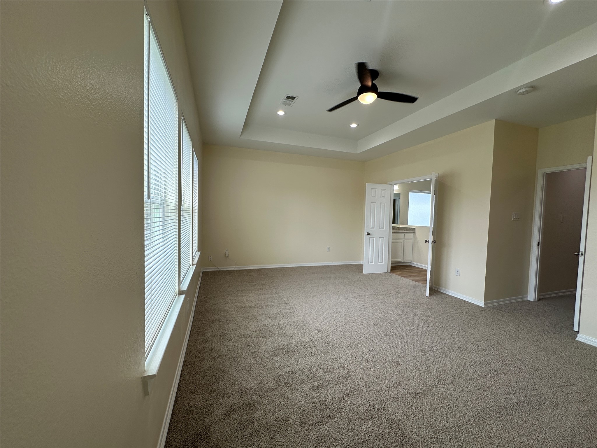 2015 Harlem Street Houston, TX 77020 - Photo 12 of 18 an empty room with windows and cabinet