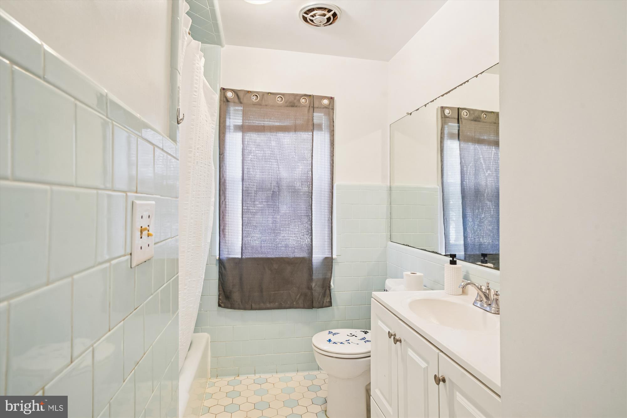 8803 Biggs Ford Road Walkersville, MD 21793 - Photo 18 of 58 a bathroom with a sink a toilet and shower