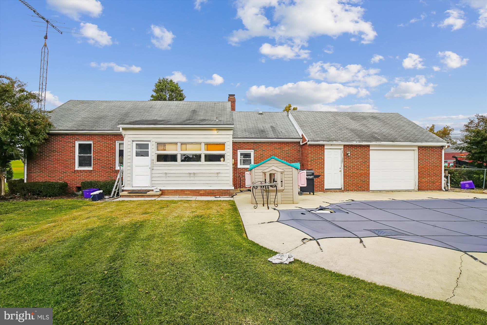8803 Biggs Ford Road Walkersville, MD 21793 - Photo 2 of 58 a front view of a house with a yard and garage