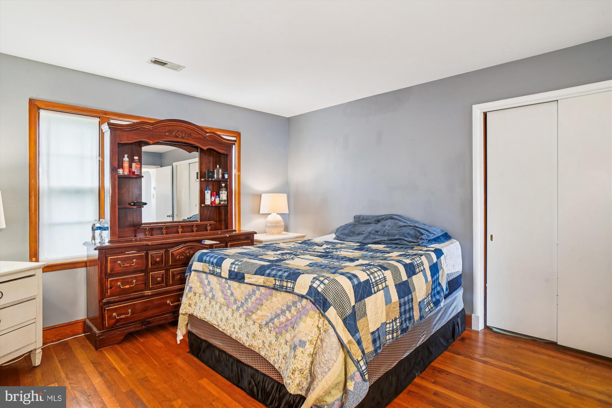 8803 Biggs Ford Road Walkersville, MD 21793 - Photo 22 of 58 a bedroom with a bed and wooden floor