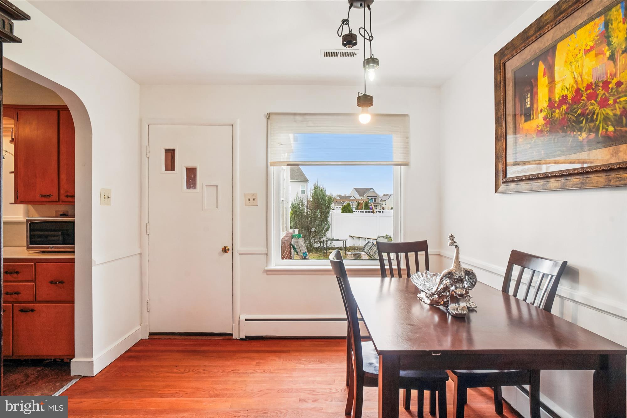 8803 Biggs Ford Road Walkersville, MD 21793 - Photo 25 of 58 a view of a dining room with furniture window and wooden floor