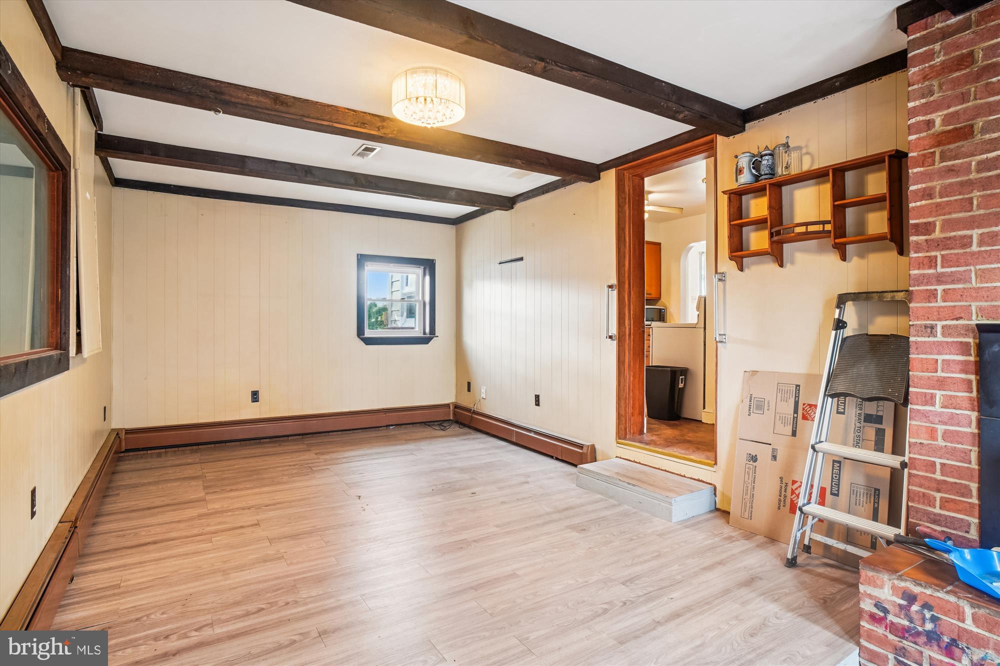 8803 Biggs Ford Road Walkersville, MD 21793 - Photo 29 of 58 a view of an empty room with wooden floor and a window
