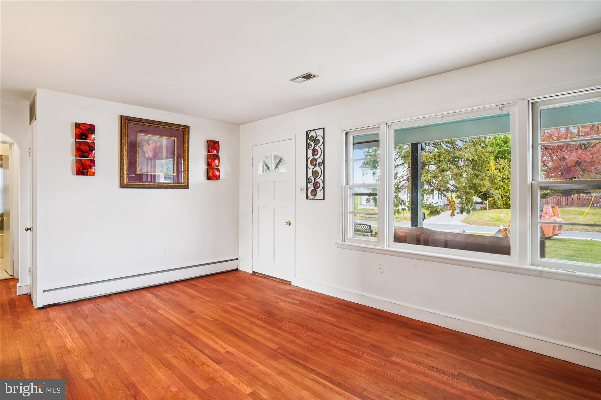 8803 Biggs Ford Road Walkersville, MD 21793 - Photo 40 of 58 a view of empty room with wooden floor and fan