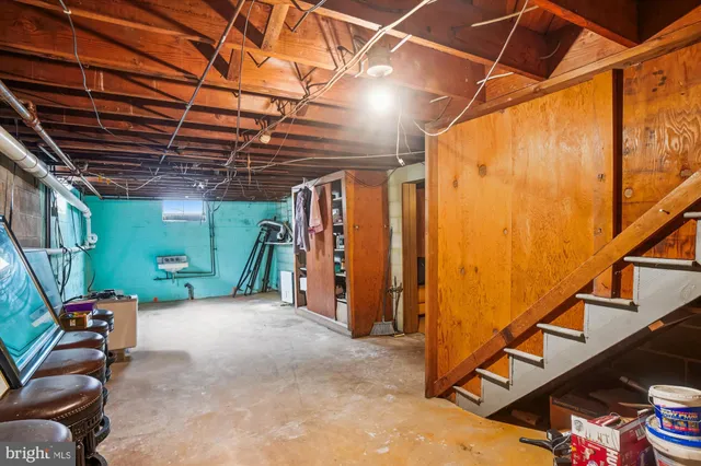 a view of a park with iron fence