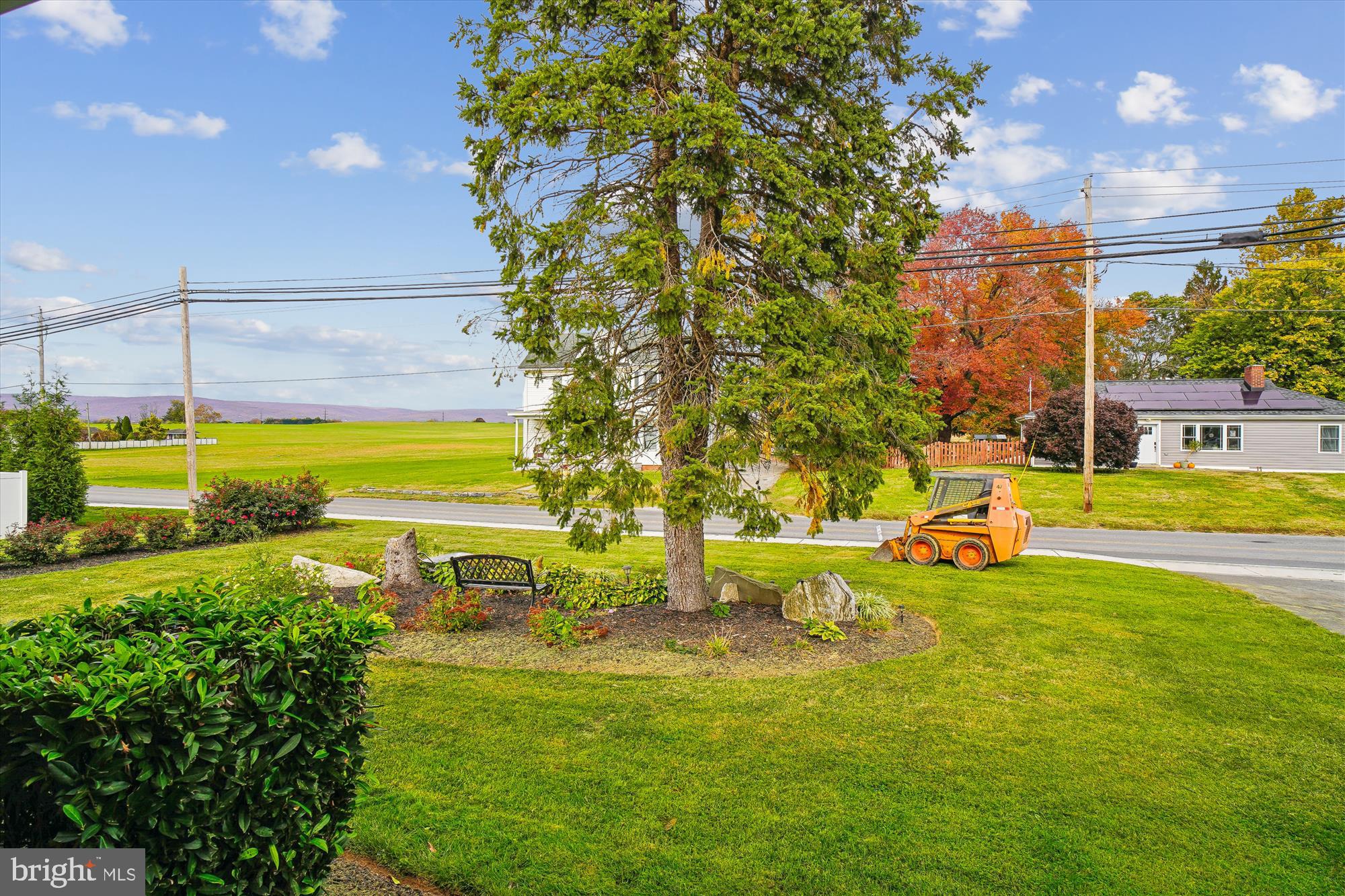 8803 Biggs Ford Road Walkersville, MD 21793 - Photo 7 of 58 a view of a swimming pool with an outdoor seating and a yard