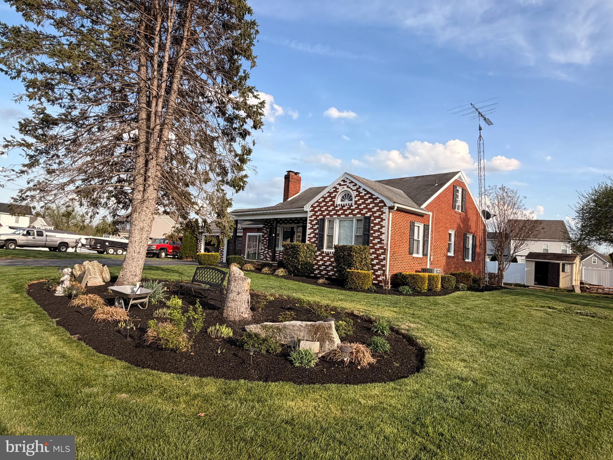8803 Biggs Ford Road Walkersville, MD 21793 - Photo 76 of 80 a front view of a house with a yard table and chairs