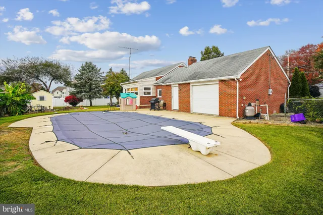 a view of outdoor space pool patio and yard