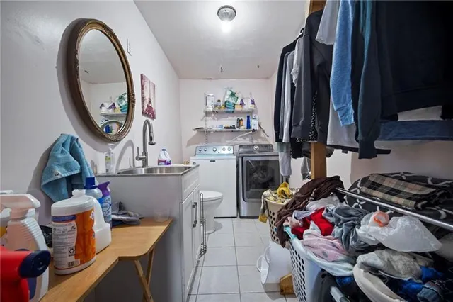 a kitchen with stainless steel appliances a stove a sink and a stove