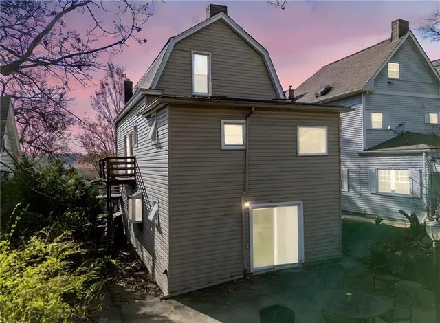 a front view of a house with yard