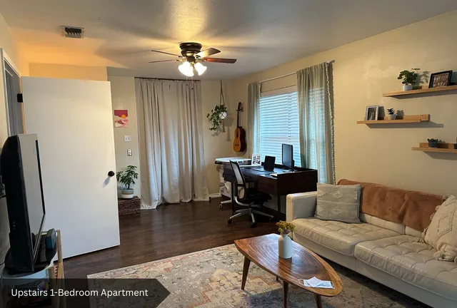 a kitchen with stainless steel appliances white cabinets and a granite counter tops