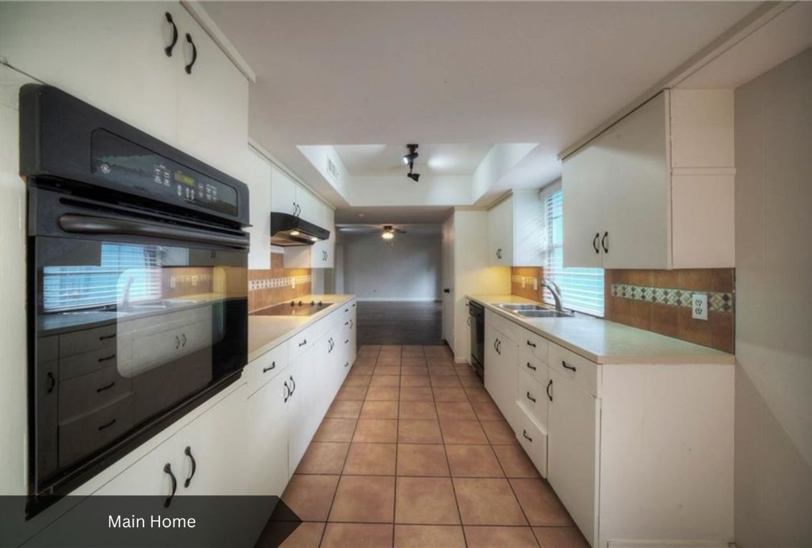 2105 Rabb Road Austin, TX 78704 - Photo 8 of 39 a large kitchen with granite countertop lots of counter top space