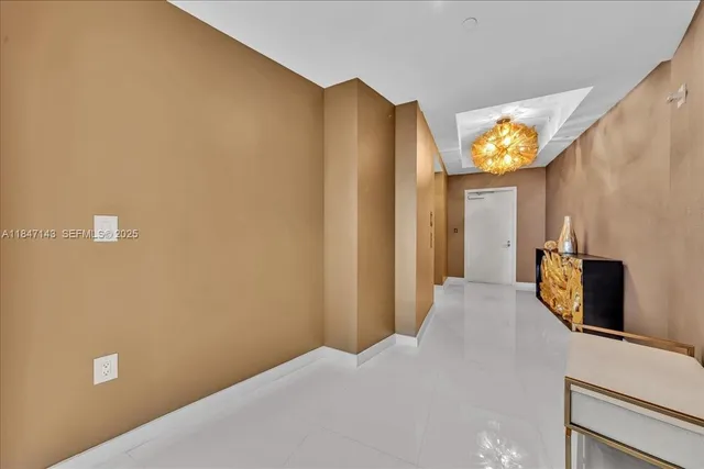 a view of a hallway with entryway