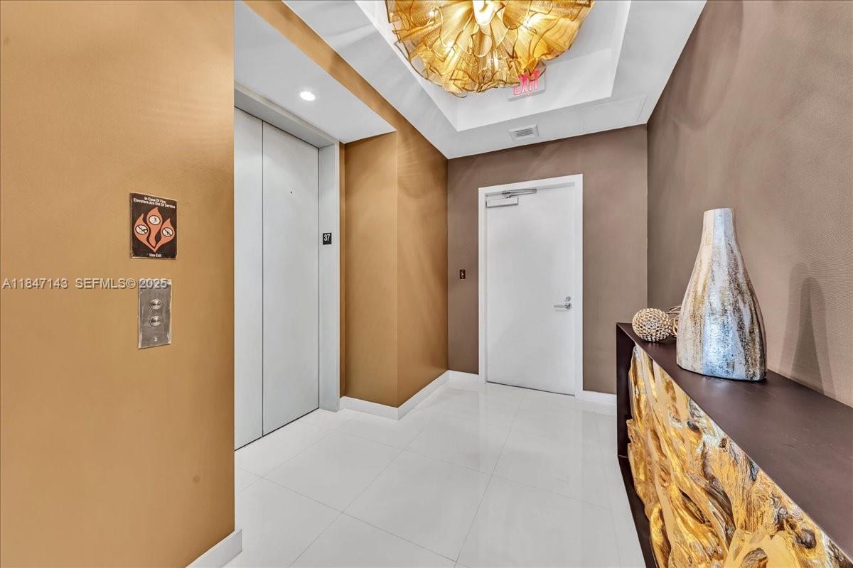 851 Northeast 1st Avenue, Unit 3711 Miami, FL 33132 - Photo 36 of 47 a view of a hallway with entryway