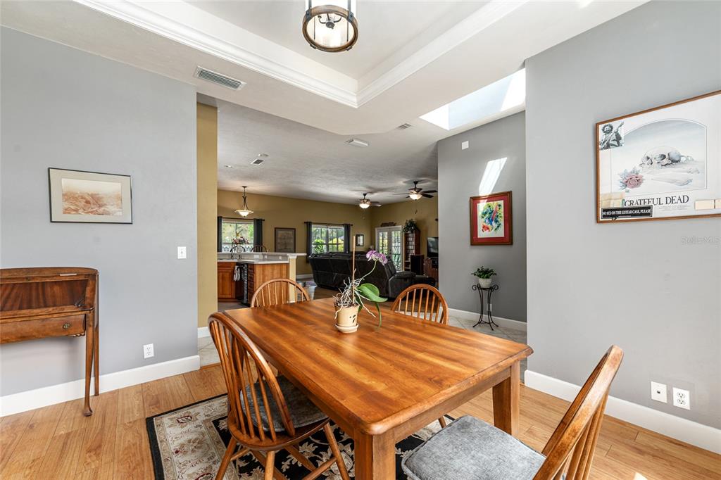 8420 Southwest 92nd Lane Gainesville, FL 32608 - Photo 14 of 46 a view of a dining room with furniture