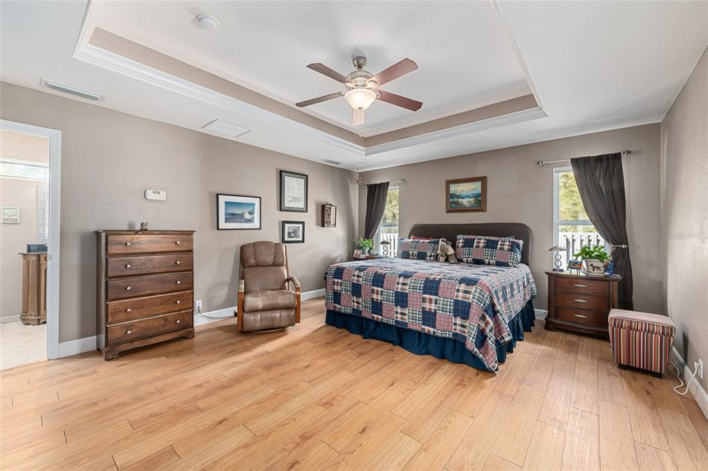 8420 Southwest 92nd Lane Gainesville, FL 32608 - Photo 21 of 46 a bedroom with a bed and furniture