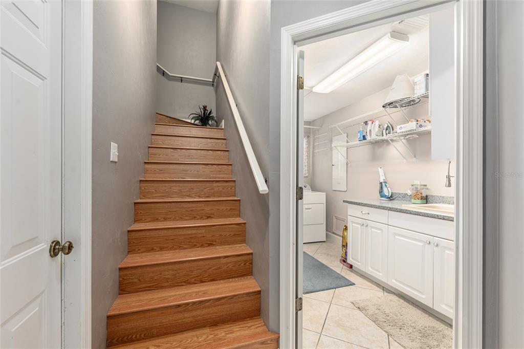 8420 Southwest 92nd Lane Gainesville, FL 32608 - Photo 28 of 46 a view of entryway and hall with wooden floor